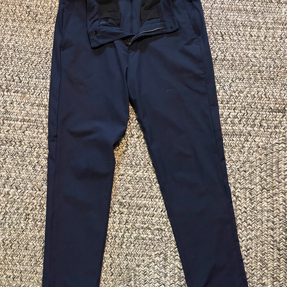 lightly worn Lululemon Blue Pants with Tapered Fit and Smooth Fabric
